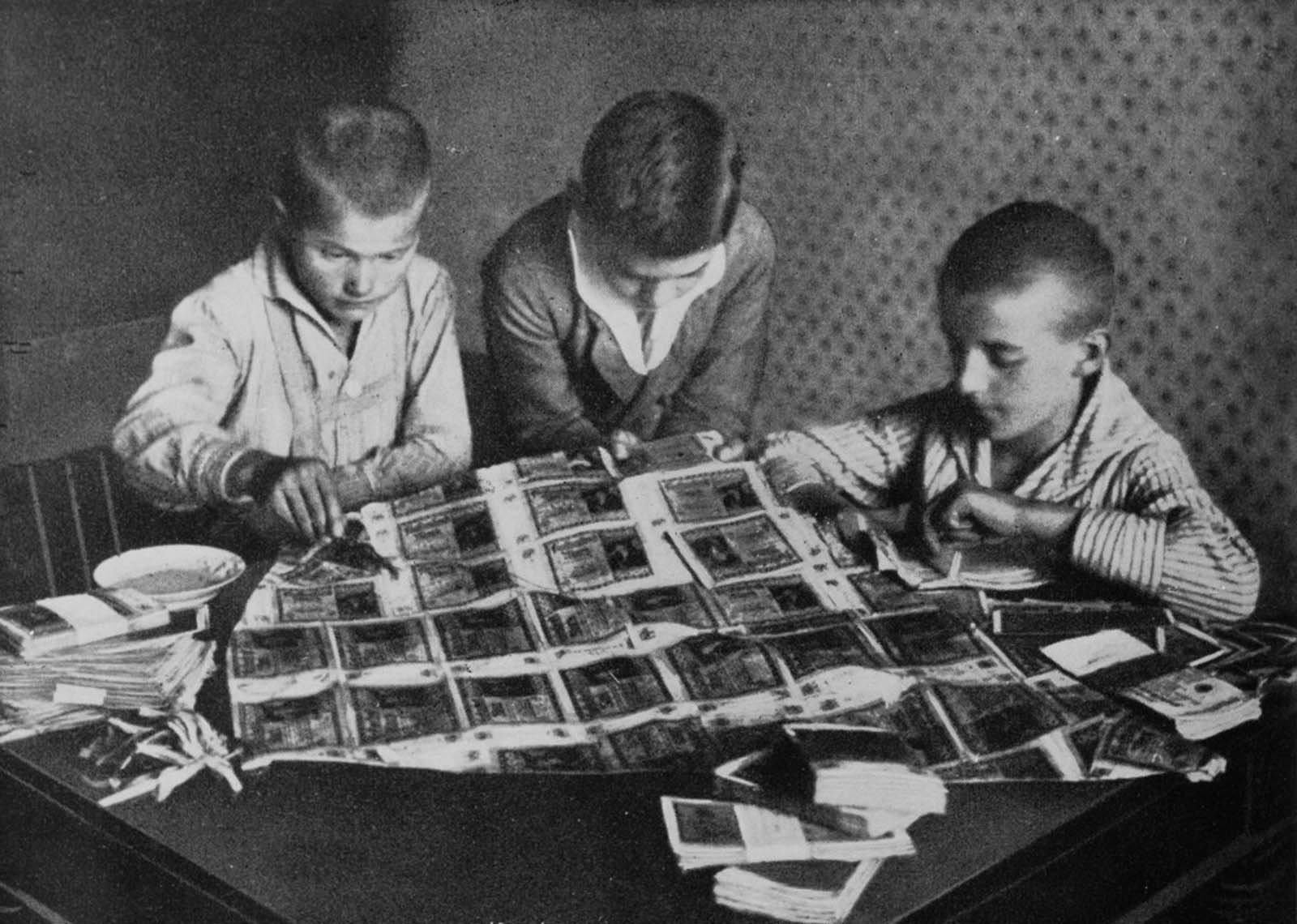 Children playing with stacks of worthless German marks during the Weimar hyperinflation